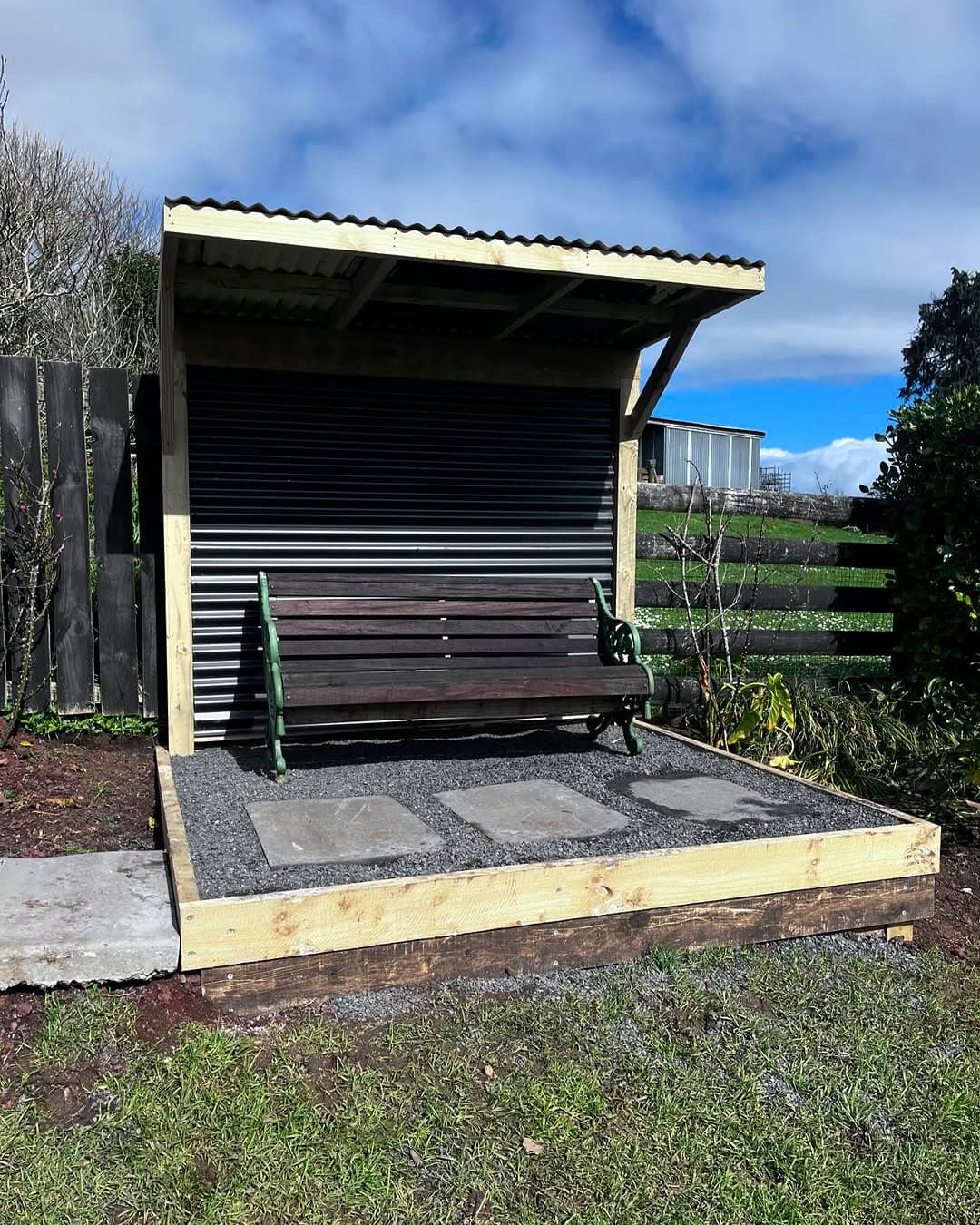 Seating platform with roof and wind shade